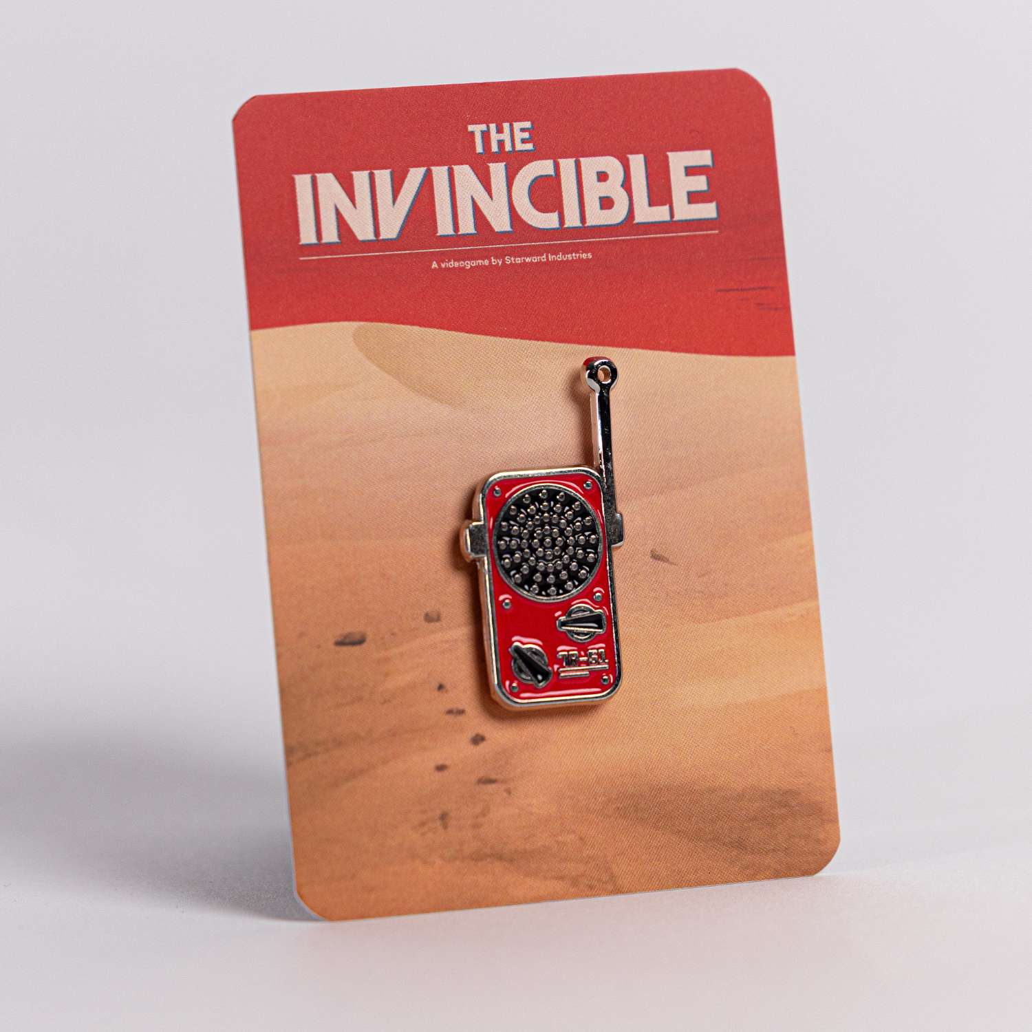 The Invincible Tracker Pin – Tilt